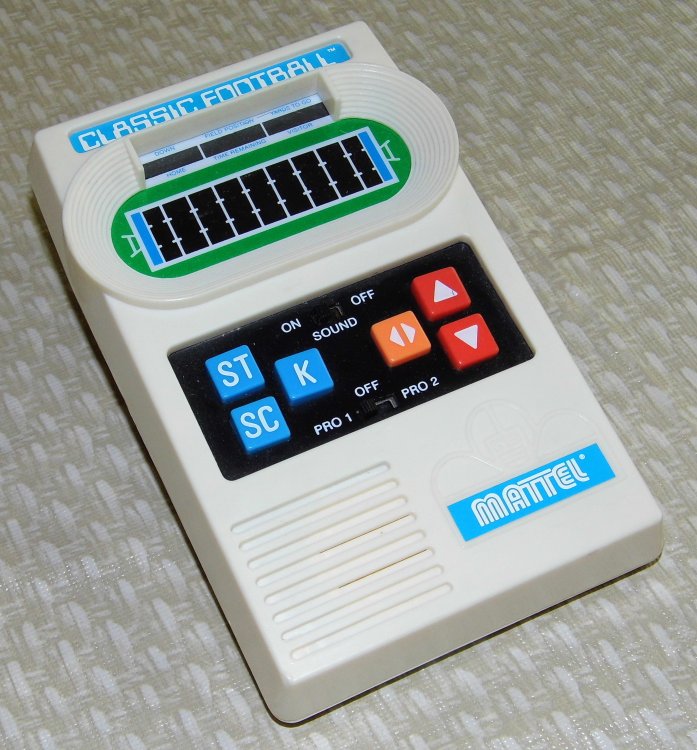 59ad0651c164c_Mattel_Classic_Football_A_2000_Re-Release_of_the_Popular_1970s_Electronic_Game_Made_in_China_(Handheld_Electronic_Game).thumb.jpg.a3944a0a50d161f8d2a3bcba9dccc6eb.jpg