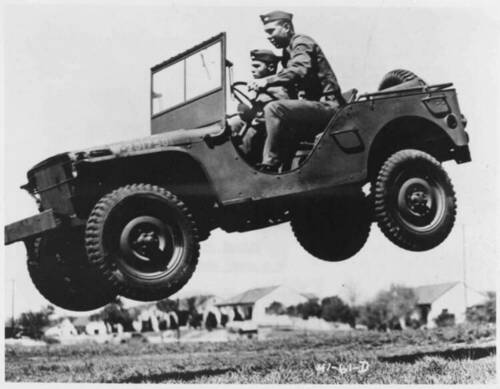 687857280_2776px-These_soldiers_go_up_in_the_air_to_prove_that_the_Armys_new_quarter_ton_truck_can_take_it._-_NARA_-_195336.thumb.jpg.0e9b58891f3919d1a474ebea771b406f.jpg