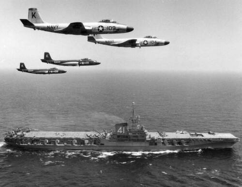 F2H-3 McDonnell Banshees Of VF-31 Over USS Midway (CVA 41) Mediterranean Sea - 1954 - Paint Scheme Change.jpg