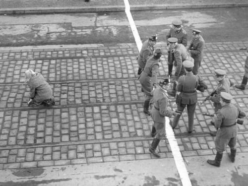 Berlin - Young Girl Escapes Across The Border From East To West - 1955 - West German Border Police Stand Down East German Border Guards.jpg
